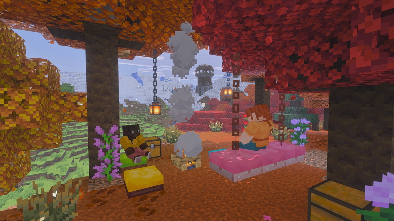 Two Minecraft characters camping beneath colorful autumn trees, with snowy mountains and a tower in the distance.